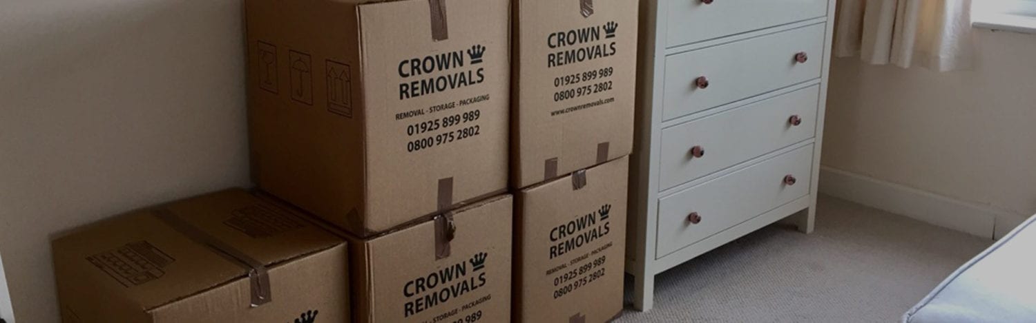 Crown Removals boxes stacked ready for an office move in Warrington Crown Removals boxes stacked ready for an office move in Warrington