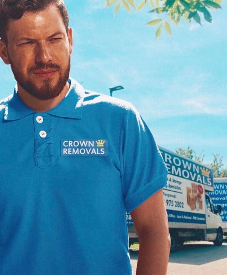 Crown Removals team member in branded uniform Crown Removals team member in branded uniform